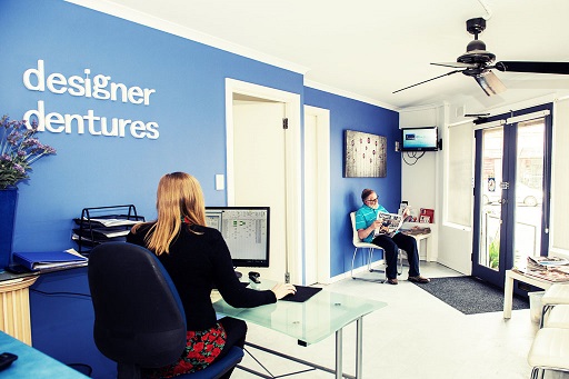 Patient consultation at Designer Dentures